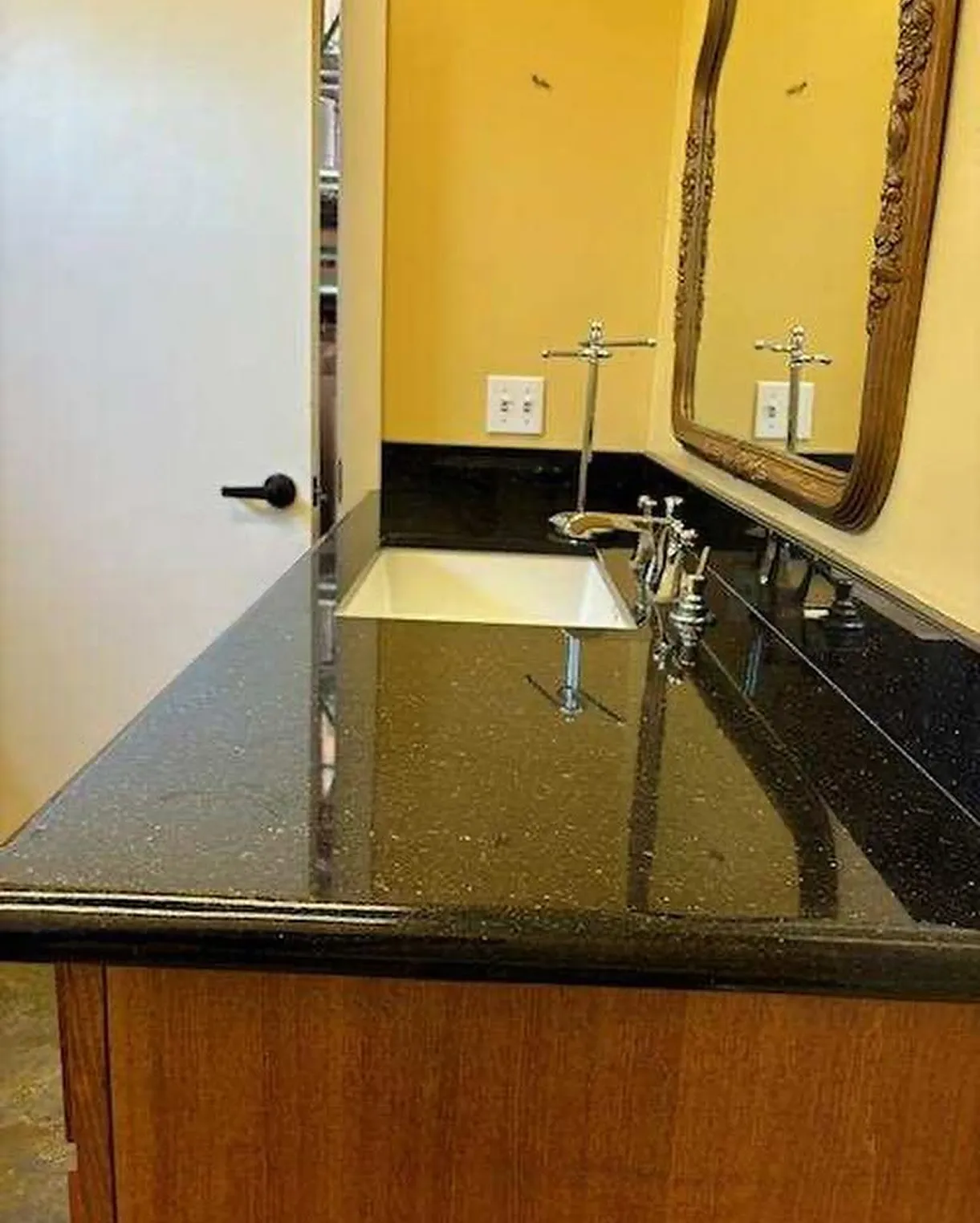 The same vanity counter polished to a shine after cleaning